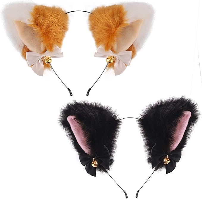 Two Fly Clothing Co. plush cat ear headbands in white and black with satin bows and gold bells.