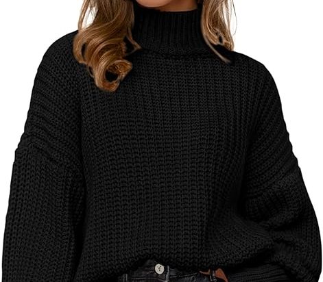 Woman wearing a Fly Clothing Co. black oversized chunky knit turtleneck sweater
