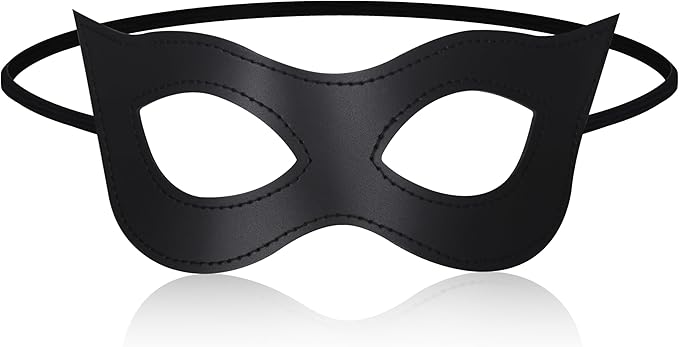 "A front-facing view of the Black Cat Mask for Women by FLY Clothing Co. The mask is made of sleek black leather-like material with visible perimeter stitching, featuring pointed cat-ear corners and almond-shaped eye cutouts. It includes a thin black elastic head strap and is displayed on a reflective white surface."