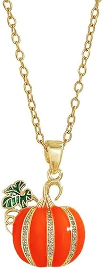 "Studio shot of the Rhinestone Pumpkin Pendant by FLY Clothing Co., featuring a gold-tone link chain suspending a vibrant orange pumpkin charm. The pumpkin is detailed with vertical rows of clear rhinestones separating its segments and features a curved gold stem with a green enameled leaf accent on the left."