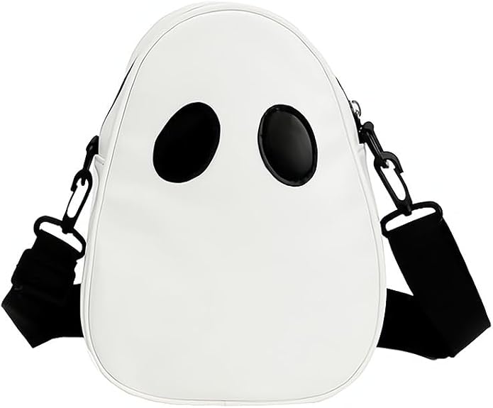 A studio shot of the Cute Ghost Purse by FLY Clothing Co. The handbag is shaped like a friendly cartoon ghost in bright white with a matte finish. It features two large, circular black eyes and a small, smiling black mouth. The purse includes a white top handle and a detachable silver-tone chain shoulder strap, shown against a plain white background."
