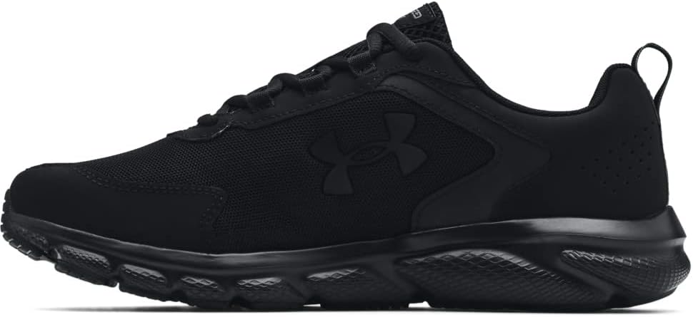 A pair of black and white Men's Charged Assert 9 athletic shoes featuring a lightweight mesh upper, supportive leather overlays, and a thick "Charged" cushioning midsole with a durable rubber outsole.