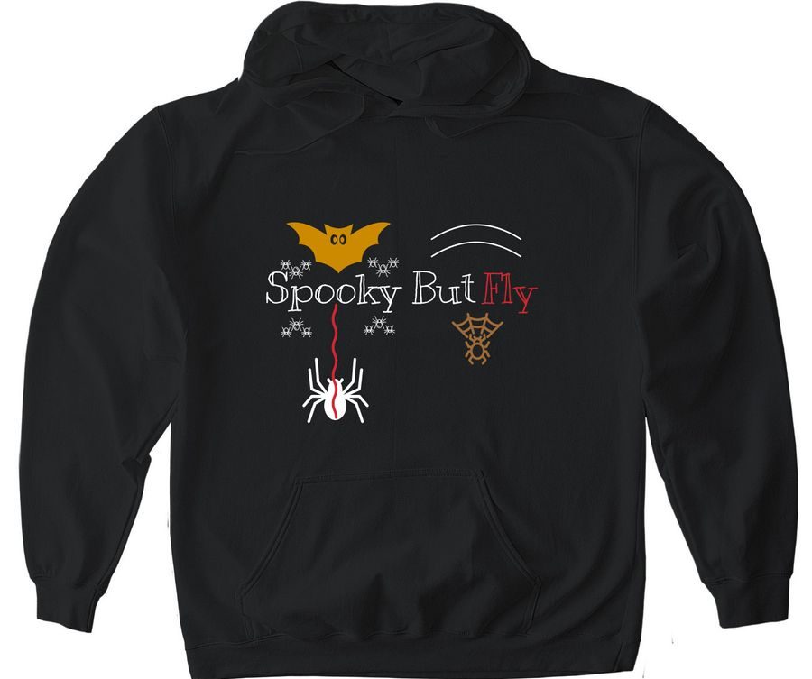 A front view of the FLY Clothing Co. "Spooky But Fly" pullover hoodie in black. The chest features a minimalist graphic design with the words "Spooky But Fly" in a clean white font. Above the text is a golden-yellow bat silhouette with outspread wings, and below it, a small white spider hangs from a silk thread. The model is wearing the hoodie in a relaxed fit.