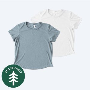 Two blank Allmade Eco Triblend women's scoop neck t-shirts, one in heathered steel blue and one in heathered white, displayed on a clean white background with a green "Eco Friendly" tree icon for custom design services.
