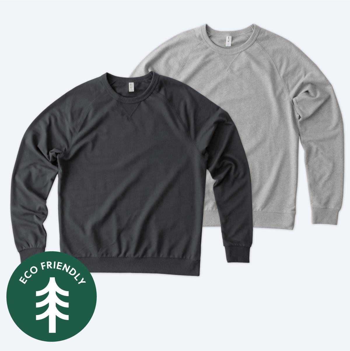 Custom Allmade organic French Terry crewneck sweatshirts in Charcoal and Heather Grey, featuring raglan sleeves and eco-friendly construction for LA and NYC brands.