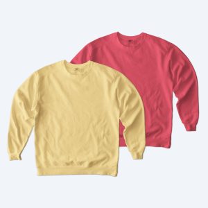 Two custom Comfort Colors Crewneck Sweatshirts in butter yellow and a vibrant watermelon pink, displayed for Fly Clothing Co’s custom design service in LA and NYC.