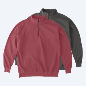 Custom Comfort Colors quarter-zip pullovers in Crimson and Charcoal grey, featuring a brass-tone zipper and garment-dyed finish for premium LA and NYC streetwear.