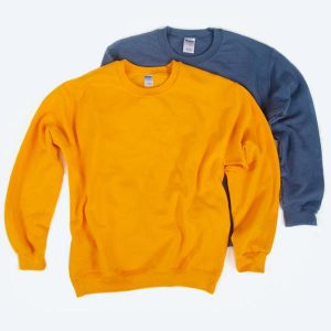 Two blank Gildan crewneck sweatshirts, one in golden yellow and one in slate blue, layered on a white background for custom design services.