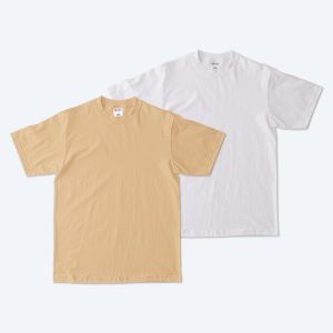 Two blank Max Heavyweight t-shirts for custom design services; one in a crisp optic white and one in a golden mustard yellow, both featuring a thick ribbed crew neckline and structured heavyweight fit.