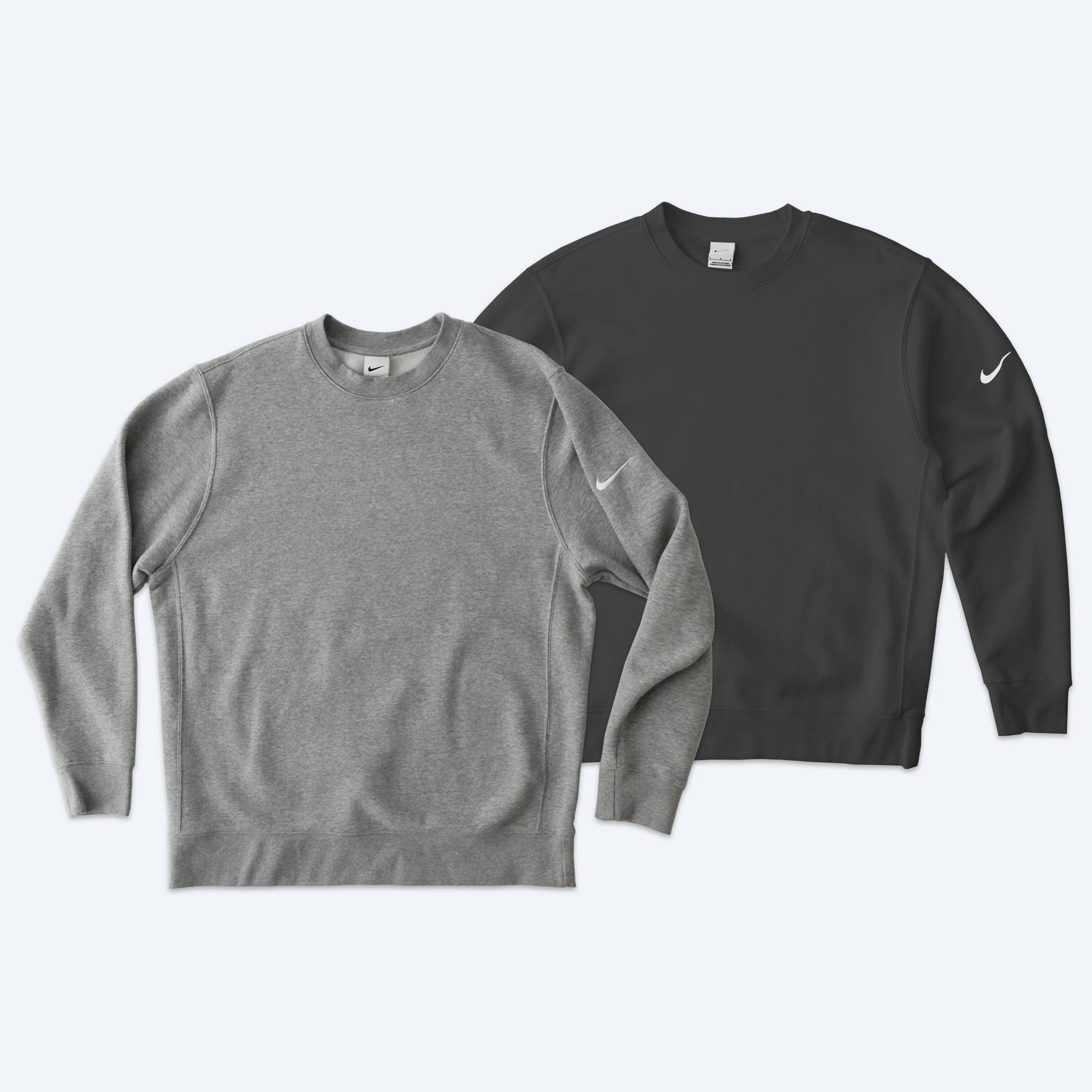 Two custom Nike Club Fleece Crewneck Sweatshirts in heather grey and anthracite black, featuring the Nike swoosh on the left sleeve, part of the Fly Clothing Co design service in LA and NYC.