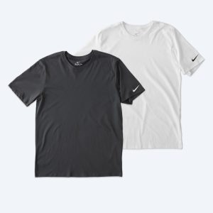 Two custom Nike Dri-FIT Jersey Blend Performance Tees in anthracite black and crisp white, featuring the iconic Nike swoosh on the left sleeve, part of Fly Clothing Co’s custom design service in LA and NYC.