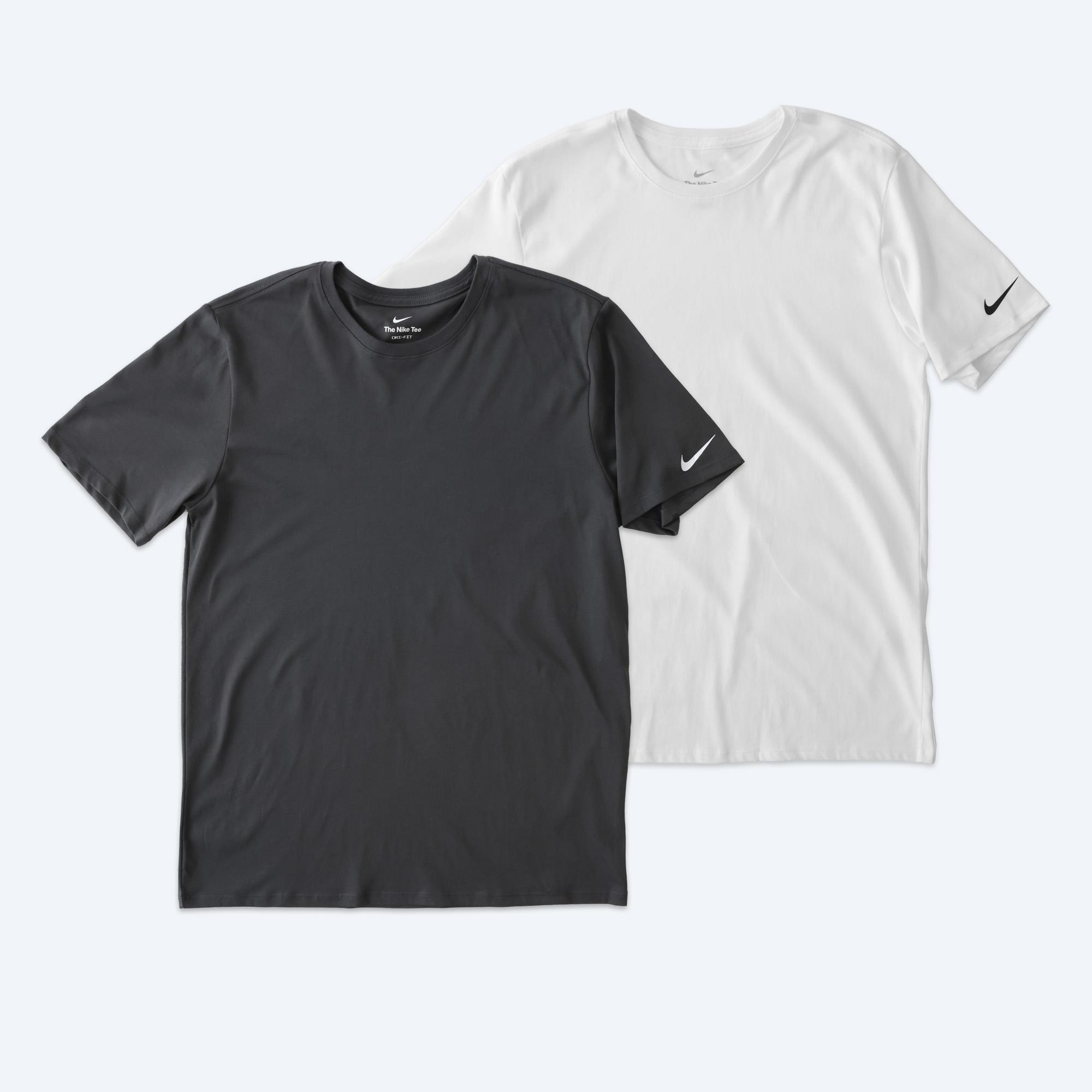 Two custom Nike Dri-FIT Jersey Blend Performance Tees in anthracite black and crisp white, featuring the iconic Nike swoosh on the left sleeve, part of Fly Clothing Co’s custom design service in LA and NYC.
