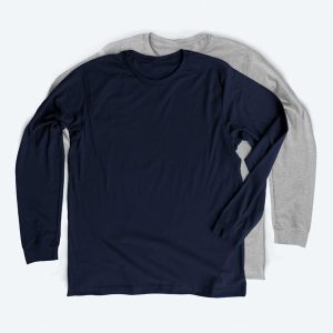 Two blank premium long sleeve t-shirts, one in deep navy blue and one in heather grey, featuring a modern retail fit and ribbed cuffs for custom apparel design services.