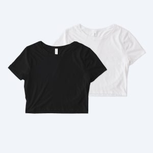 Two blank women's fitted cropped t-shirts, one in classic black and one in crisp optic white, displayed on a clean white background for custom apparel design services.