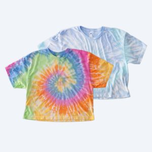 Two blank women's tie-dye cropped t-shirts, one featuring a vibrant multi-color rainbow spiral and one in a subtle blue and white cloud wash, displayed on a clean white background for custom design services.