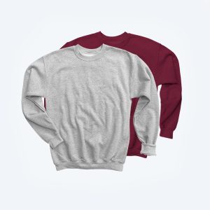 Two blank youth crewneck sweatshirts layered together, featuring one in a classic heather grey and the other in a deep maroon burgundy, highlighting the soft cotton-fleece texture and ribbed collar for custom streetwear branding.