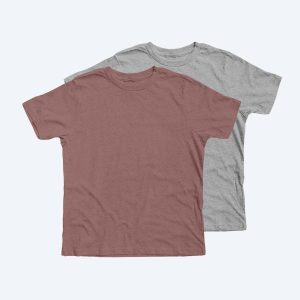 Two blank premium youth t-shirts in a dusty rose mauve and heather grey, featuring a soft retail fit and displayed on a clean white background for custom apparel design services.