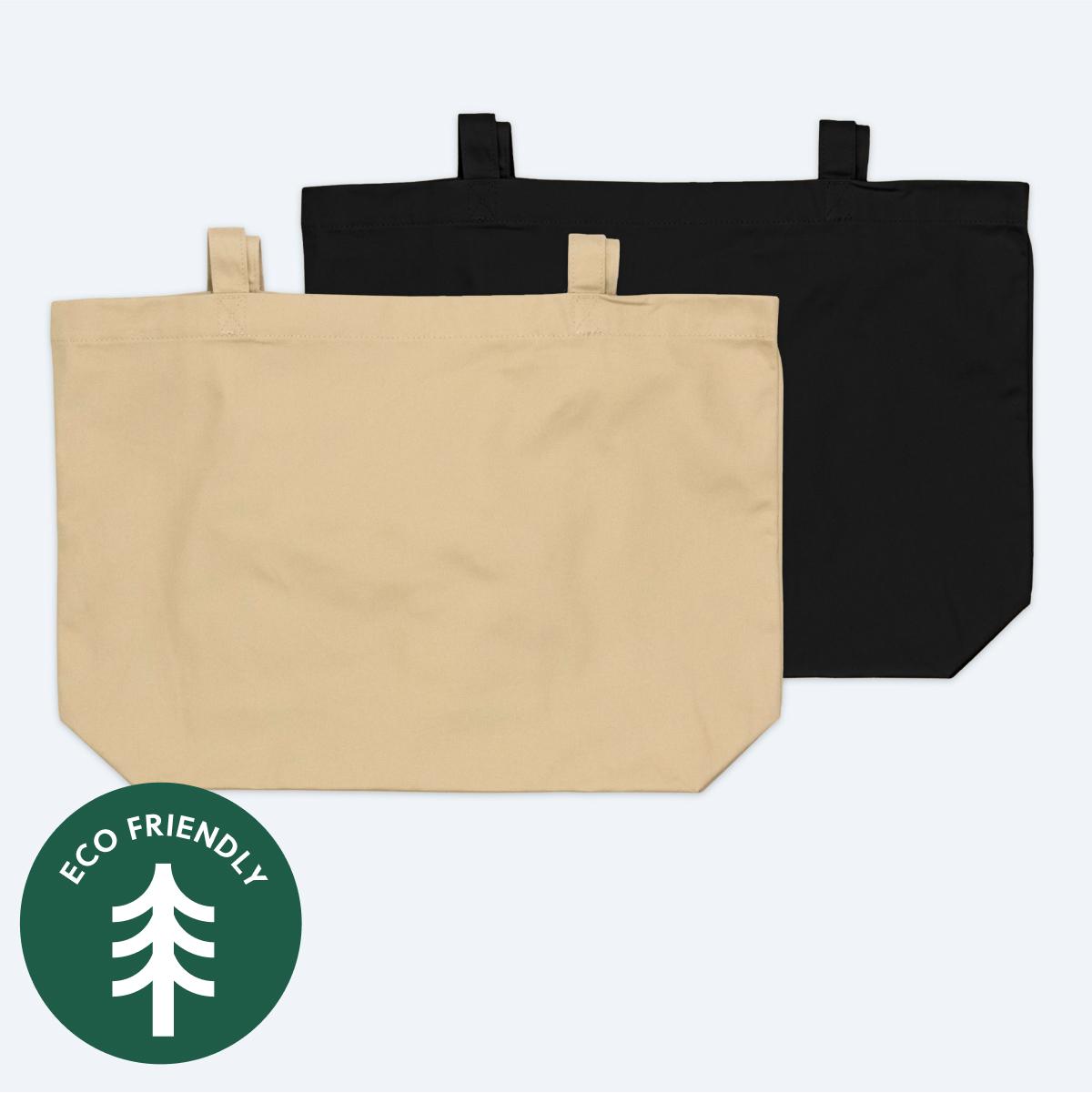 Two blank large organic cotton tote bags, one in natural tan and one in classic black, displayed on a clean white background with a green "Eco Friendly" tree icon for custom branding design services.