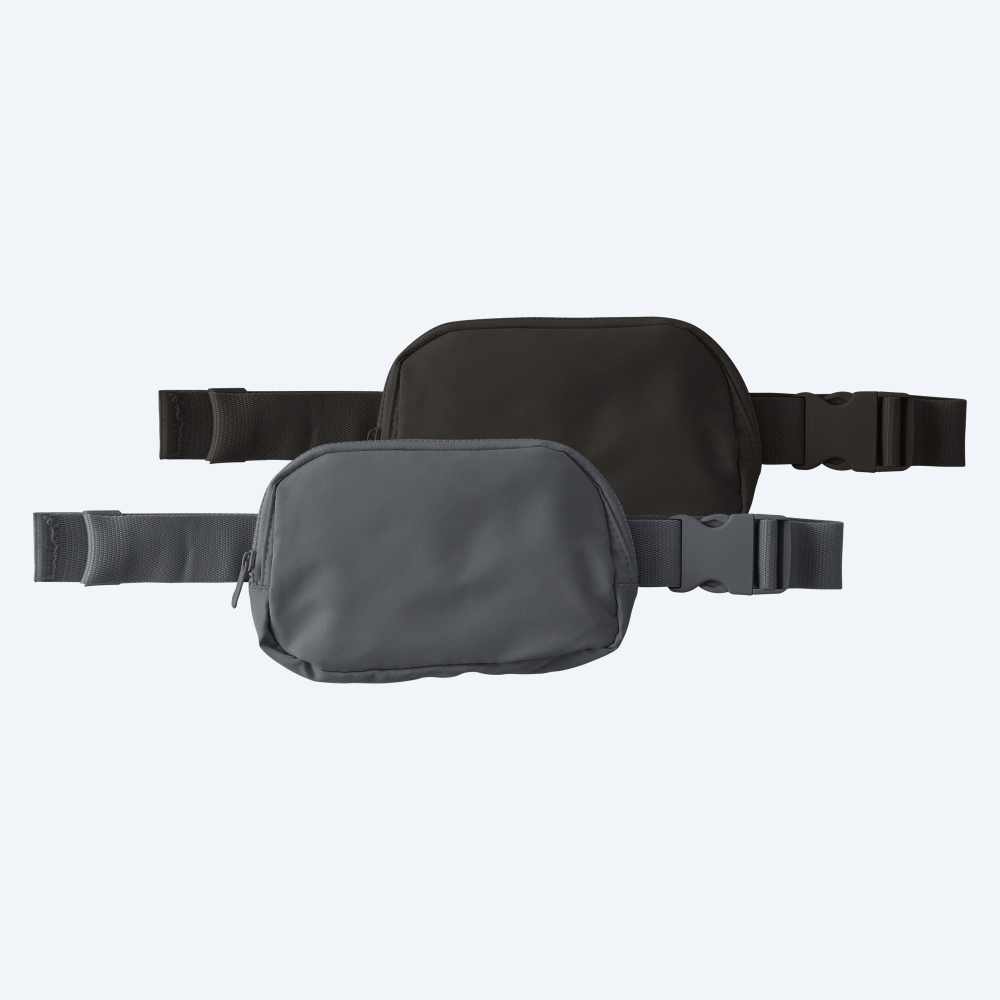 Two blank matte finish hip packs, one in deep grey and one in black, displayed with matching adjustable buckles and straps on a clean white background for custom design services.
