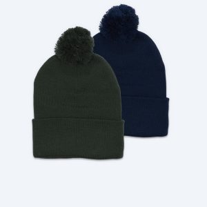 Two blank custom knit pom-pom beanies with cuffed brims, one in forest green and one in dark navy blue, displayed on a clean white background for branding design services.