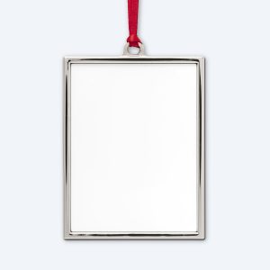 A single blank vertical silver metal portrait frame ornament with a high-polish finish and matching internal lining, hanging from a vibrant crimson red satin ribbon, displayed on a clean light grey background for professional full-color printing design services.