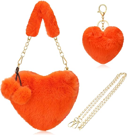The bright, saturated orange hue and heart silhouette tie perfectly into the matching orange top and knee-shaped boots.