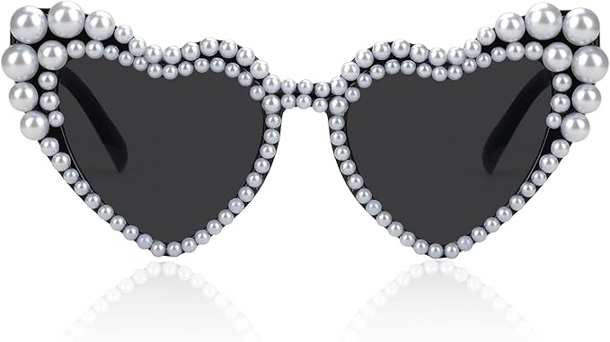 These statement heart-shaped Rhinestone Glasses are the perfect accessory to complete the bold Pink Cowgirl Summer Outfit.